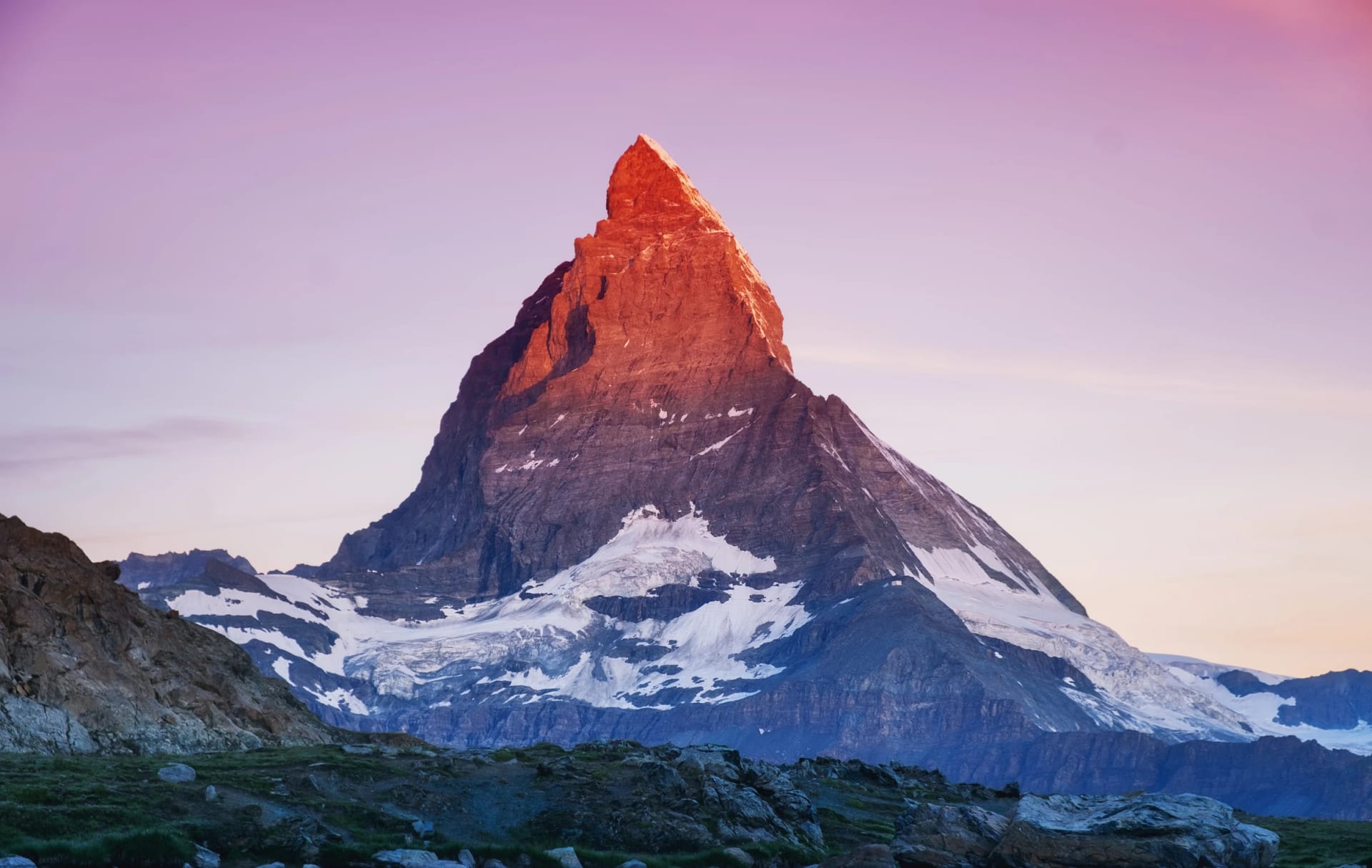 Matterhorn peak during sunrise. Beautiful natural landscape in the Switzerland. Mountains landscape at the summer time
