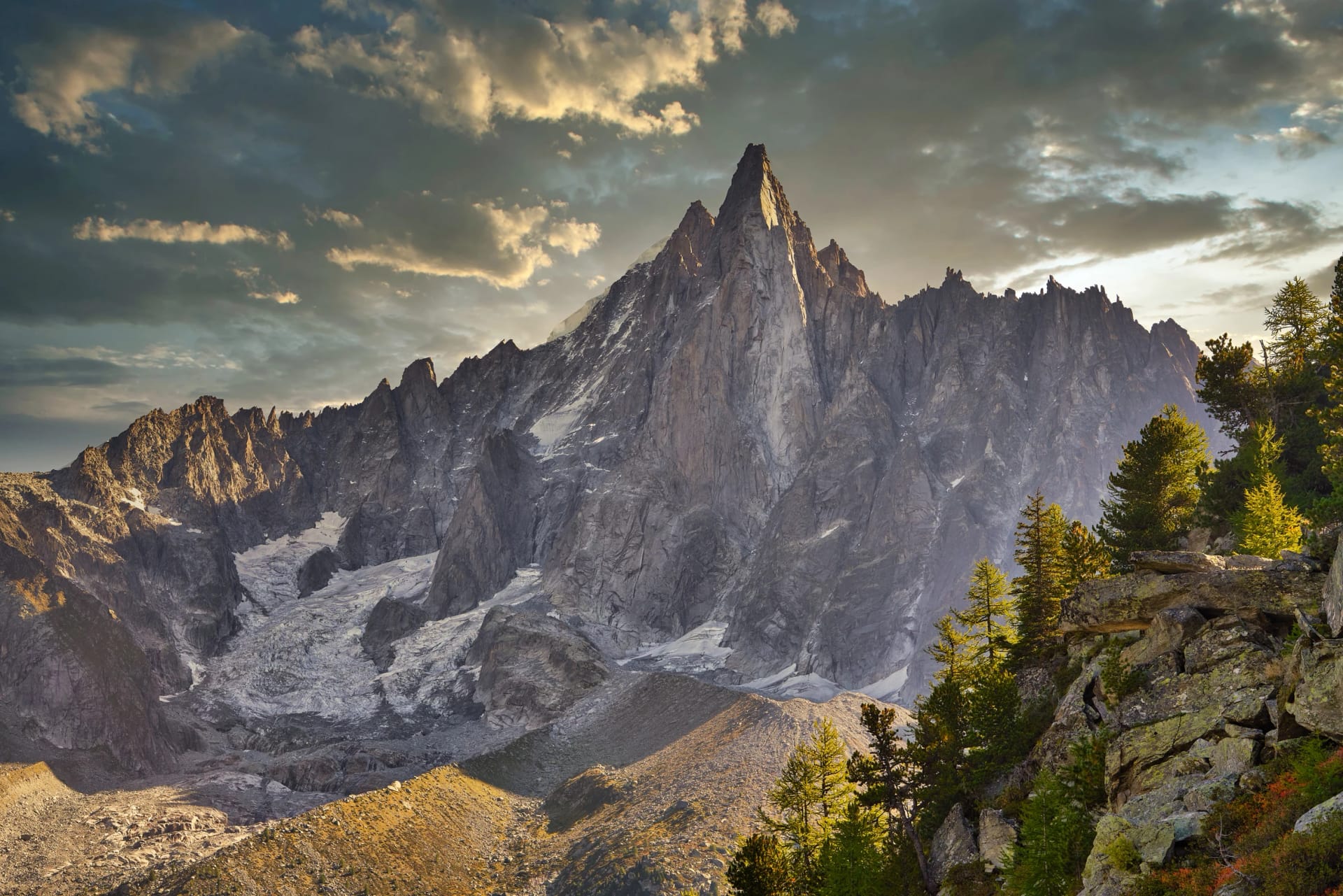 Autumn in the high mountains of the French Alps. Aiguille du Dru in the Mont Blanc massif near Chamonix, Haute-Savoie, France.