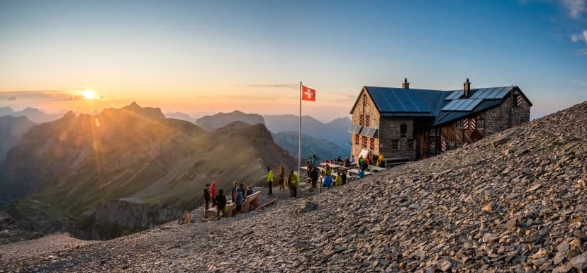 Blümlisalphütte SAC with surrounding glaciers and Blüemlisalp group