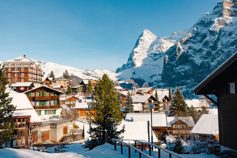 Murren , Swiss mountain village near Schilthorn and Lauterbrunnen during winter sunny day : Murren , Switzerland : December 3 , 2019