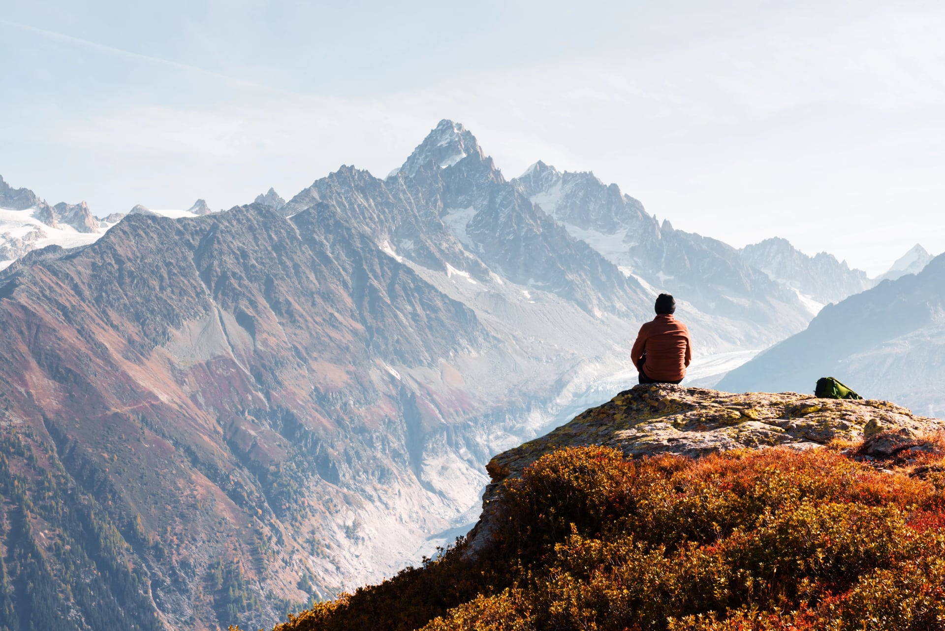 Amazing view on Monte Bianco mountains range with tourist on a foreground. Vallon de Berard Nature Preserve, Chamonix, Graian Alps. Landscape photography