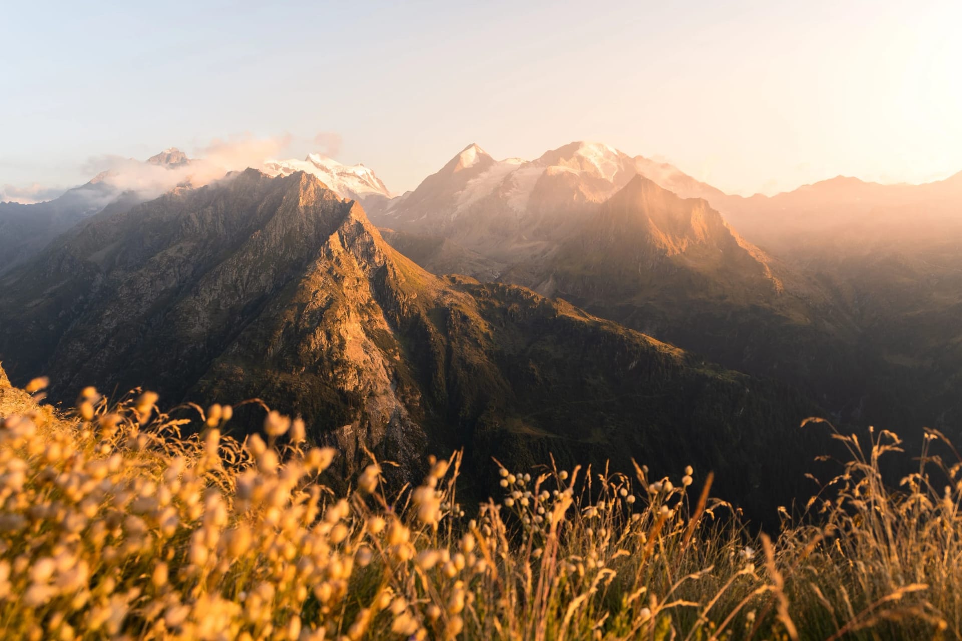 Landscape view of the sunset golden light over the Grand Combin mountain in Switzerland
