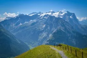 Majestic Wetterhorn peak covered by glacier as seen from Planplatten