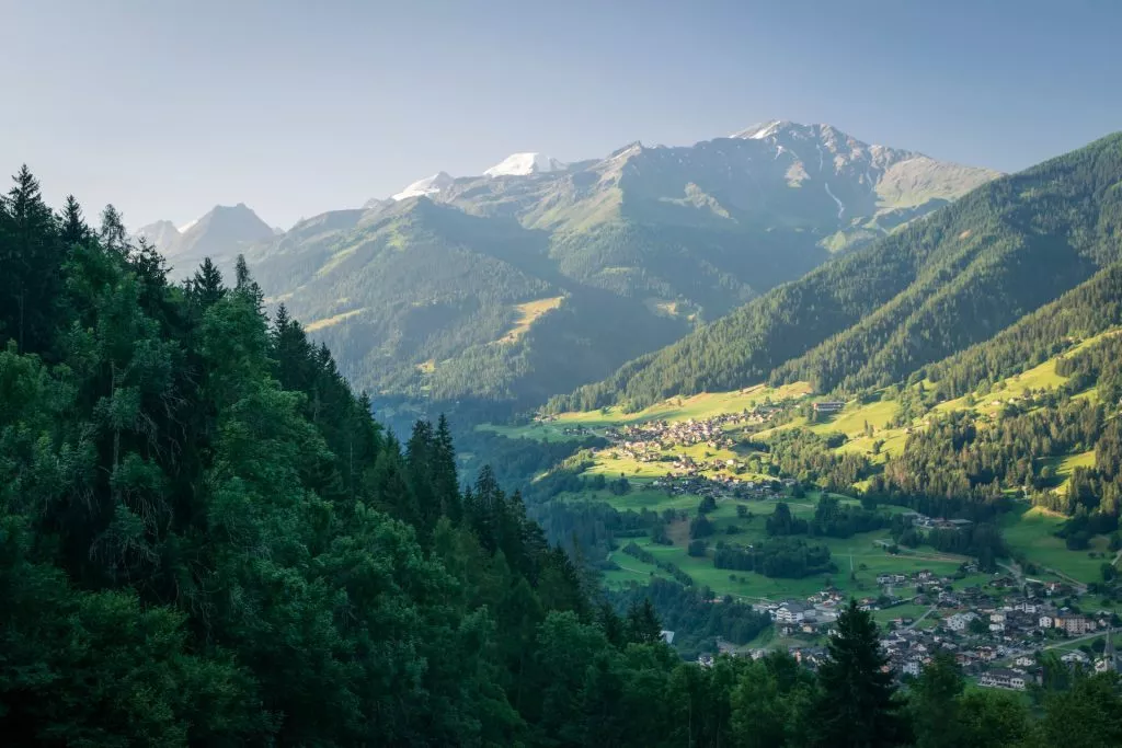 The town Le Chable in Swiss Alps seen from above on a clear bright summer morning