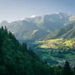 The town Le Chable in Swiss Alps seen from above on a clear bright summer morning