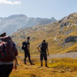 hiker on alpine plateau of Greina, Surselva