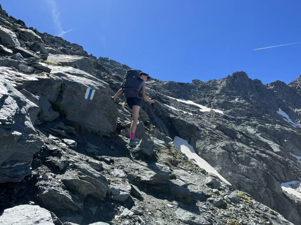 The rocky routes are usually marked with this blue and white blaze